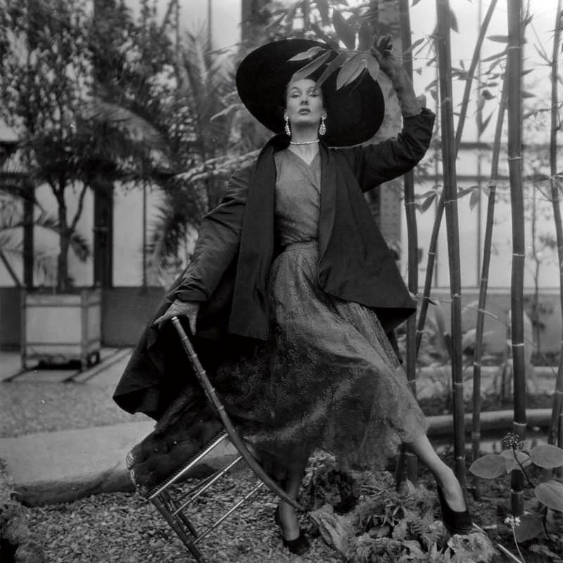 Barbara Goalen in lace dress and manteau by Balenciaga, 1950.