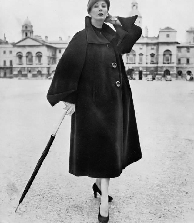 Barbara Goalen in greatcoat of luxurious pile fabric 100% llama at Harvey Nichols, 1951.