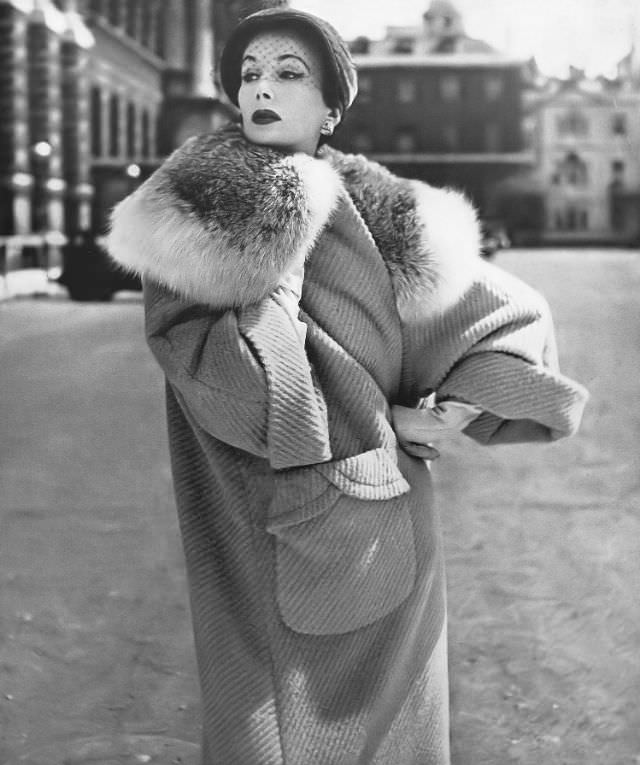 Barbara Goalen in 100% alpaca cloth coat with lynx collar at Harvey Nichols, 1952.