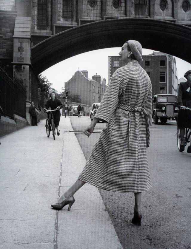 Barbara Goalen in back-belted checked Donegal tweed coat by Sybil Connolly, photo by Milton Greene, 1953.
