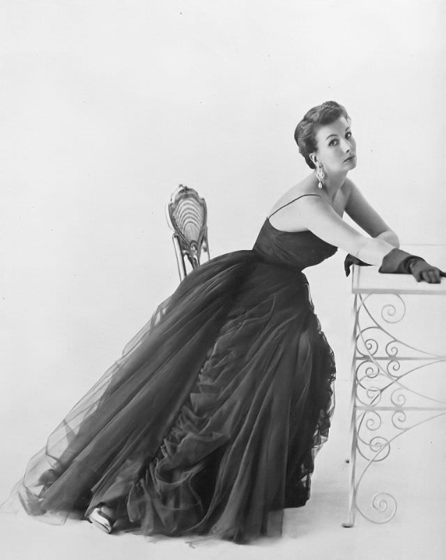 Barbara Goalen in evening dress by Susan Small, 1950.