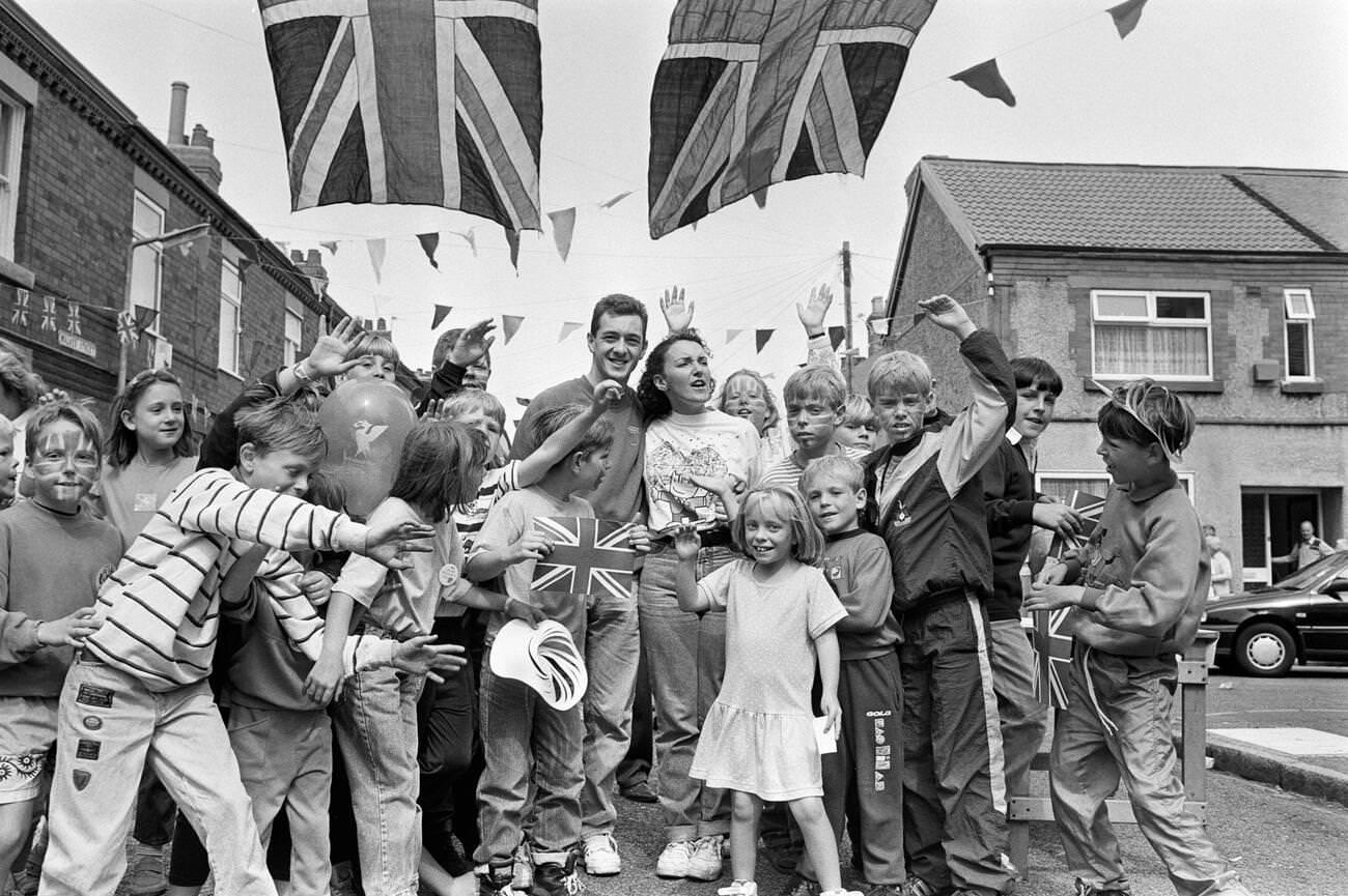 Street party for cyclist Chris Boardman after winning gold at the 1992 Olympic Games, Barcelona, August 1992.