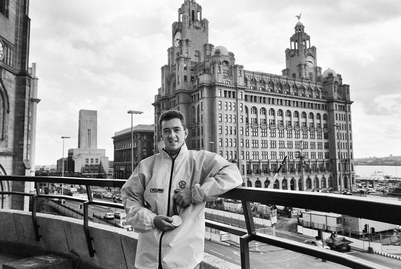 Cyclist Chris Boardman at the Royal Liver Building, Liverpool, after winning gold at the 1992 Olympic Games, Barcelona, August 1992.