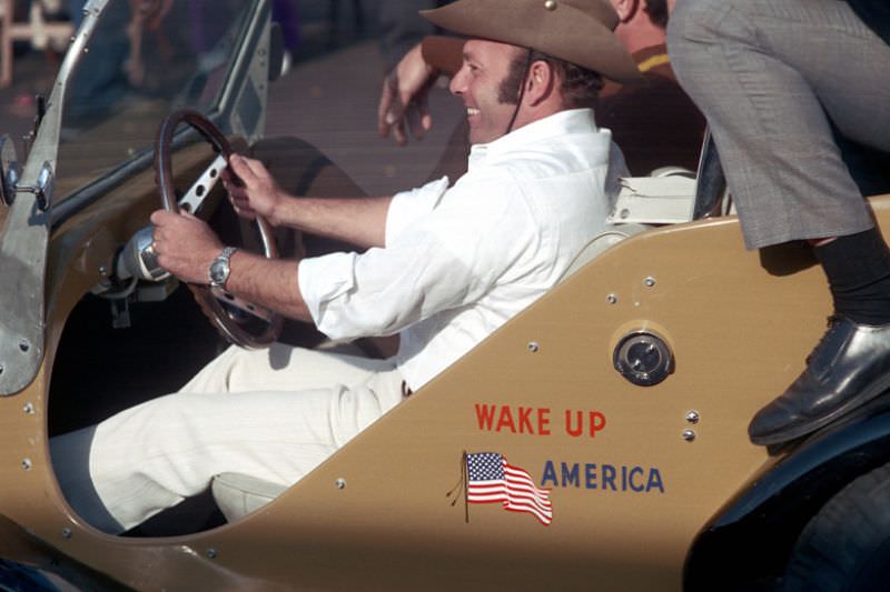 Wake Up America" dune buggy, Columbus Day parade, Boston, Massachusetts, 1971