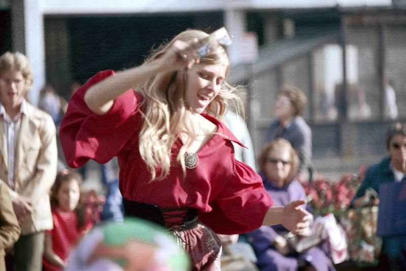Dancer with tambourine, Columbus Day parade, Boston, Massachusetts, 1971