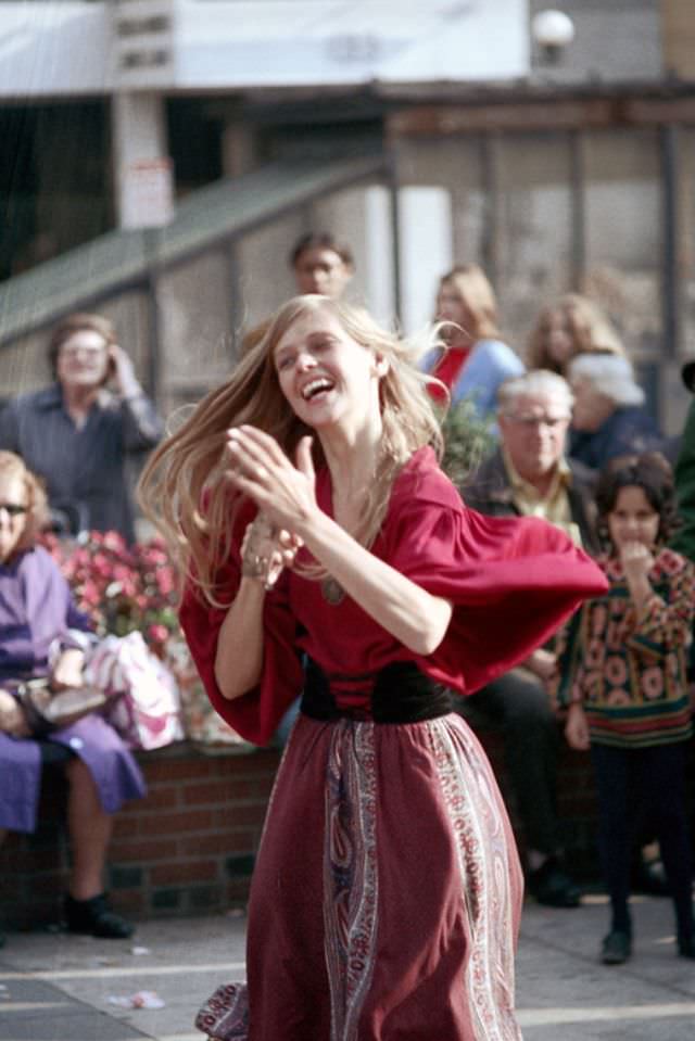 Dancer with tambourine, Columbus Day parade, Boston, Massachusetts, 1971