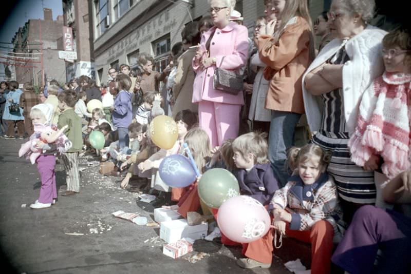 Spectators lining parade route, Columbus Day parade, Boston, Massachusetts, 1971