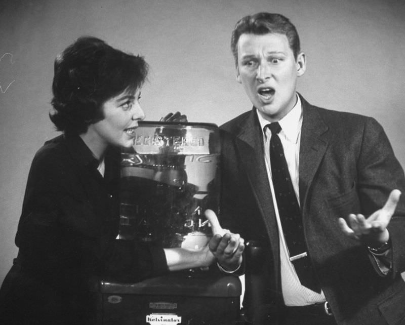 Mike Nichols and Elaine May doing skit on recent TV scandals during “Fabulous Fifties” TV special, 1960.