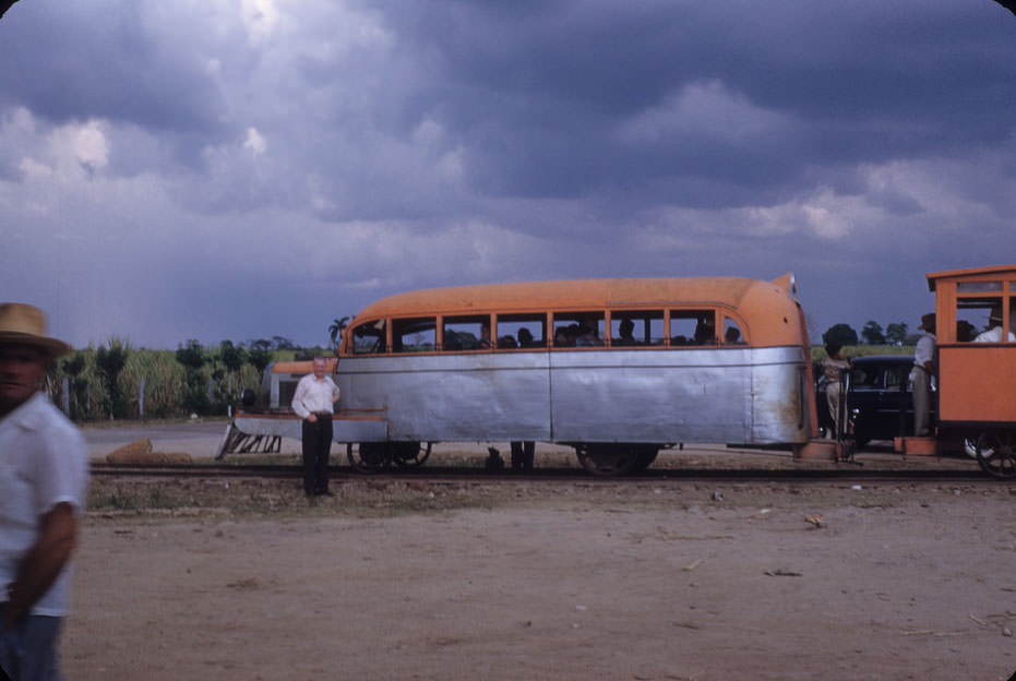 Bus converted into tram car on train tracks