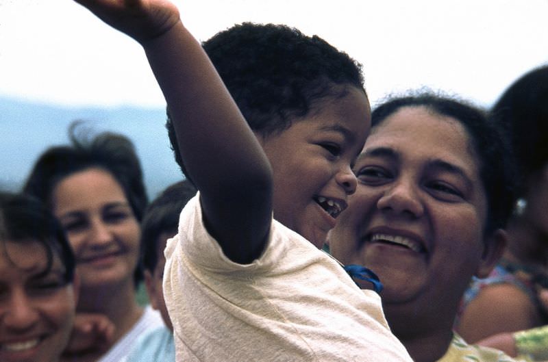 A group of happy mothers with a child, Cuba, 1976