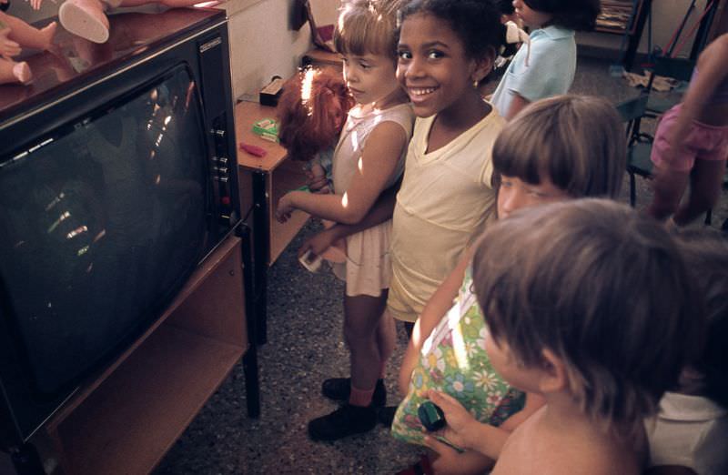 Children in a kindergarten in front of TV, Cuba, 1976