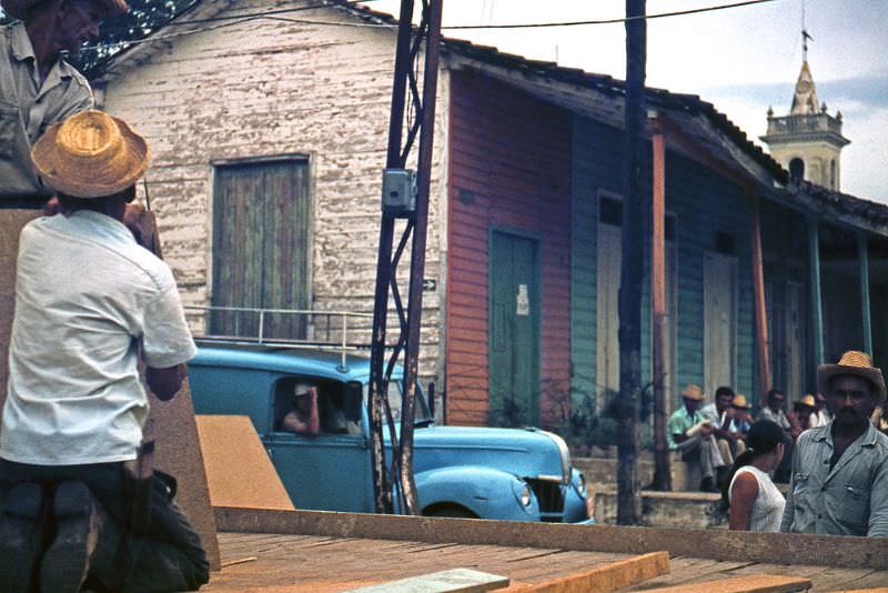 Man with a straw hat and a blue truck, Cuba, 1976
