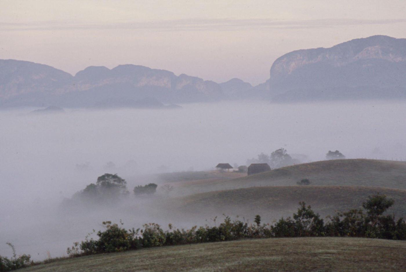 Foggy dawn in the Vinales Valley, featured in 'Closeup: Cuba - The Castro Generation', Cuba, 1977.