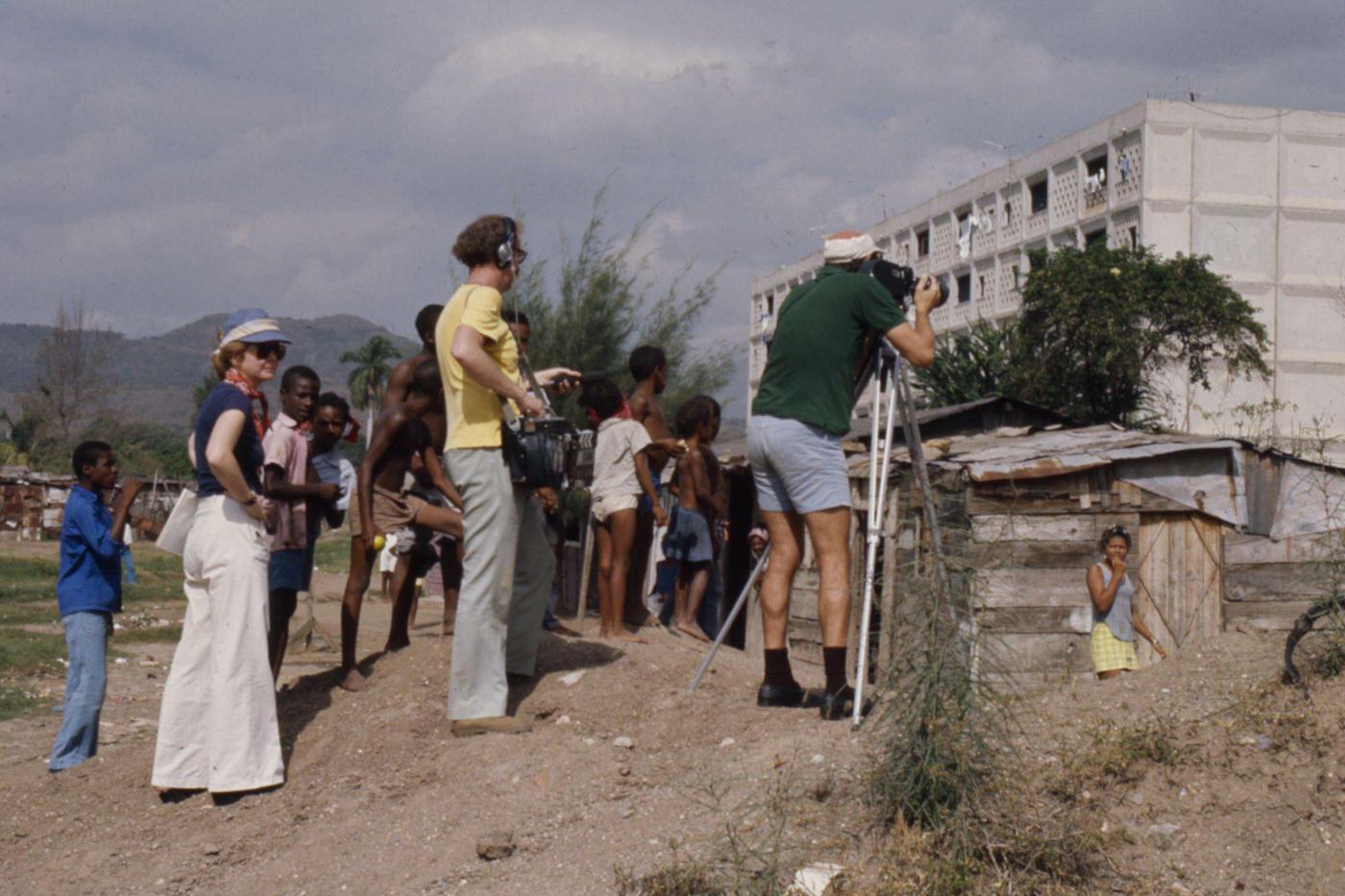 Camera crew at José Martí housing project, slums in the foreground, featured in 'Closeup: Cuba - The Castro Generation', Havana, Cuba, 1977.