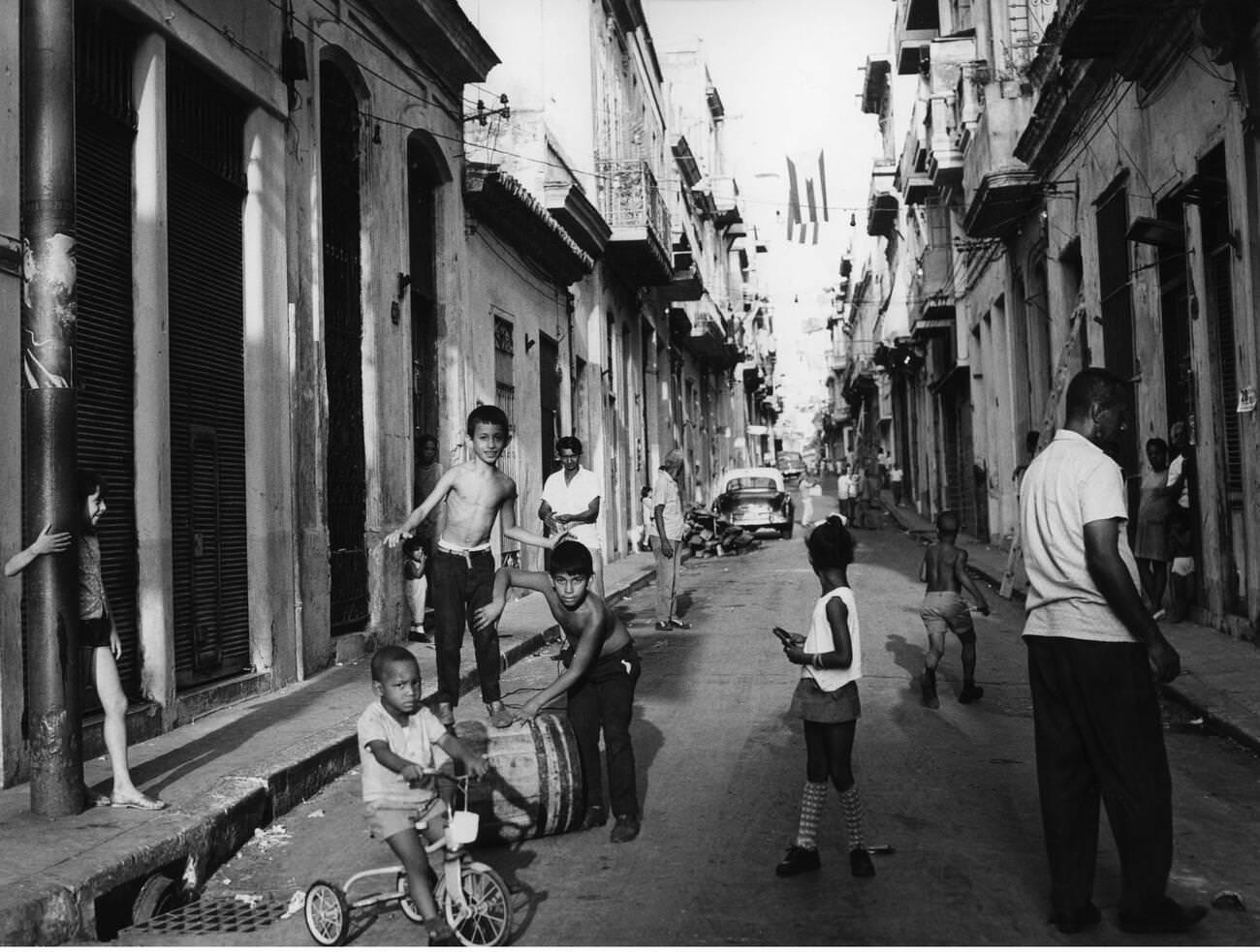 Street scene with playing children in the Old Town of Havana, August 1971,