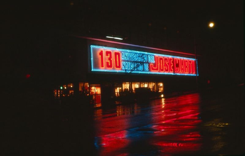 Nighttime view of a neon sign marking the 130th anniversary of the birth of Jose Marti, Havana.