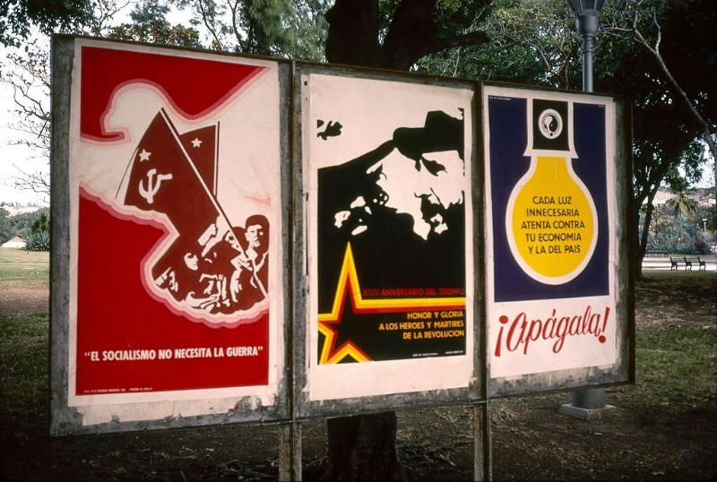 A trio of posters near a bus stop at the Plaza de la Revolucion, Havana.