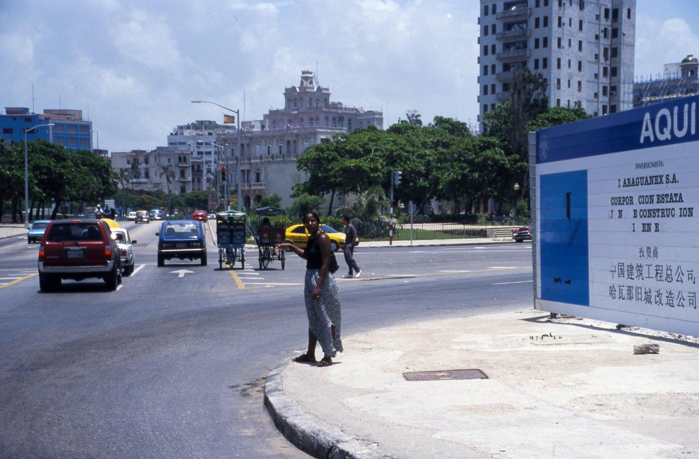 Billboards announcing new hotels to be built in Havana, Cuba, June 1999.