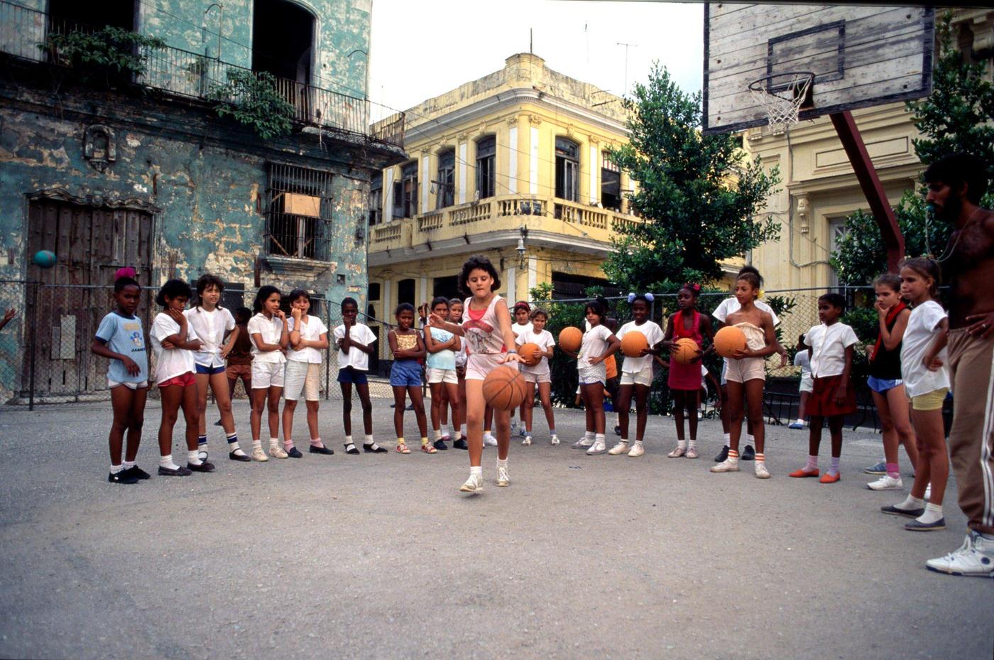 Cuban schoolchildren at a girls' school practicing basketball in Havana, Cuba, 1991.