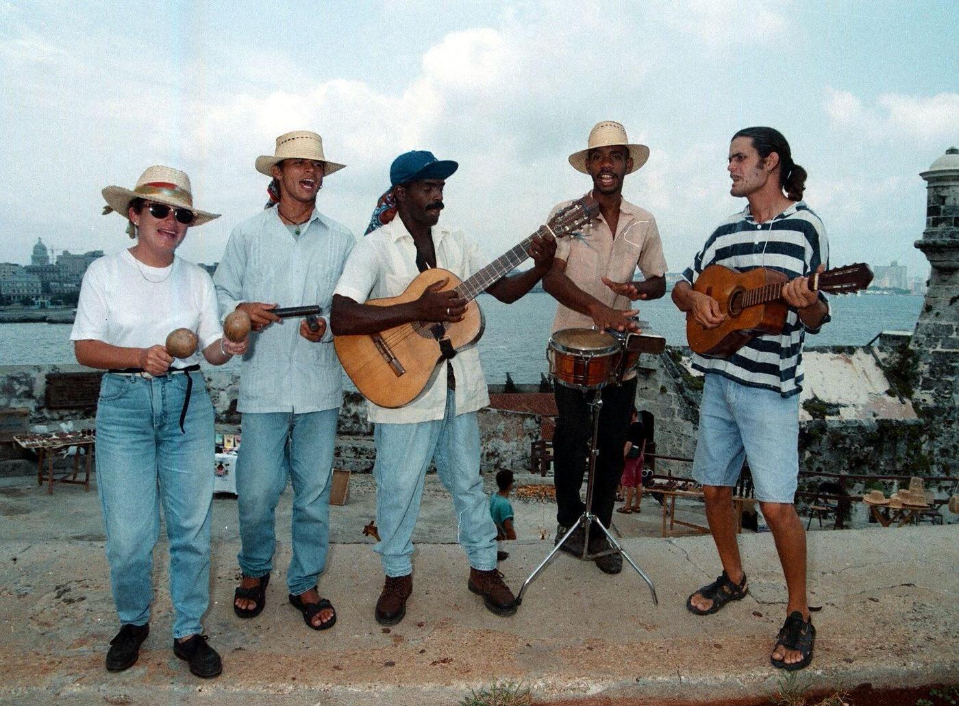 "El Moro" and street musicians in Havana, Cuba.