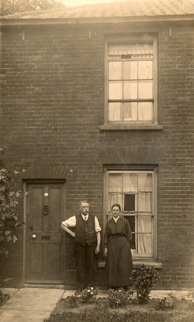 A couple in their front garden