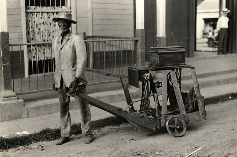 Man with sewing machine, Cuba, 1933