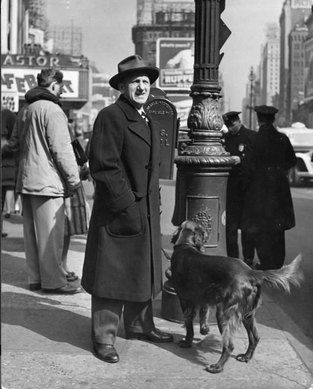 Comedian Jimmy Durante walked his Irish setter in Times Square, 1944.