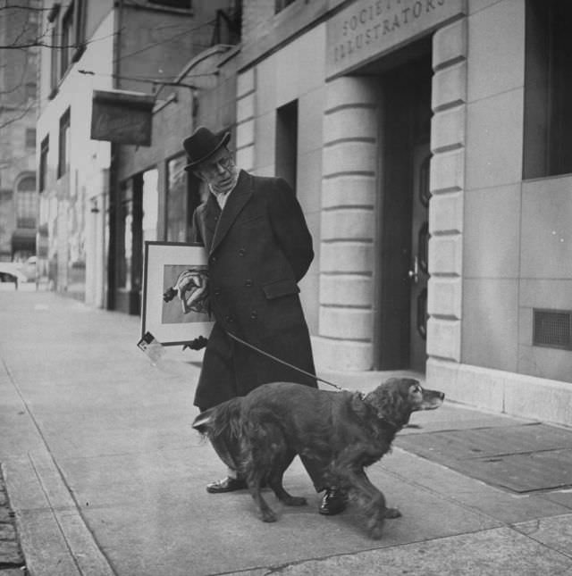 Artist Earle Winslow, with a painting under his arm, struggled to keep his Irish setter under control, New York City, 1944.