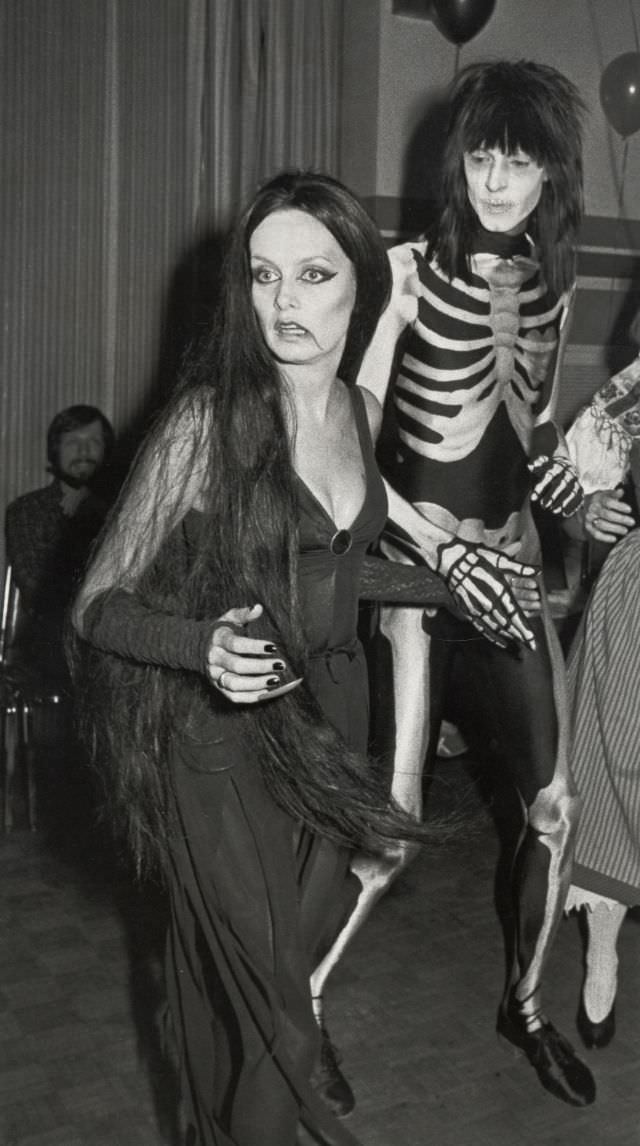 Twiggy and Tommy Tune dressing up for an event in 1984.