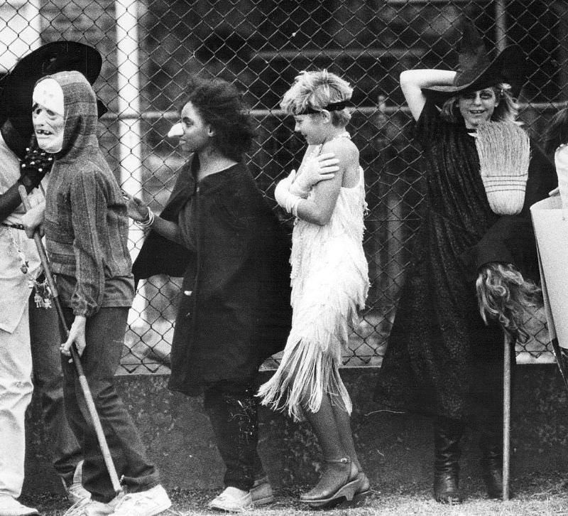 Children line up outside Park Will Elementary in Denver, waiting for their Halloween parade to start, 1986.