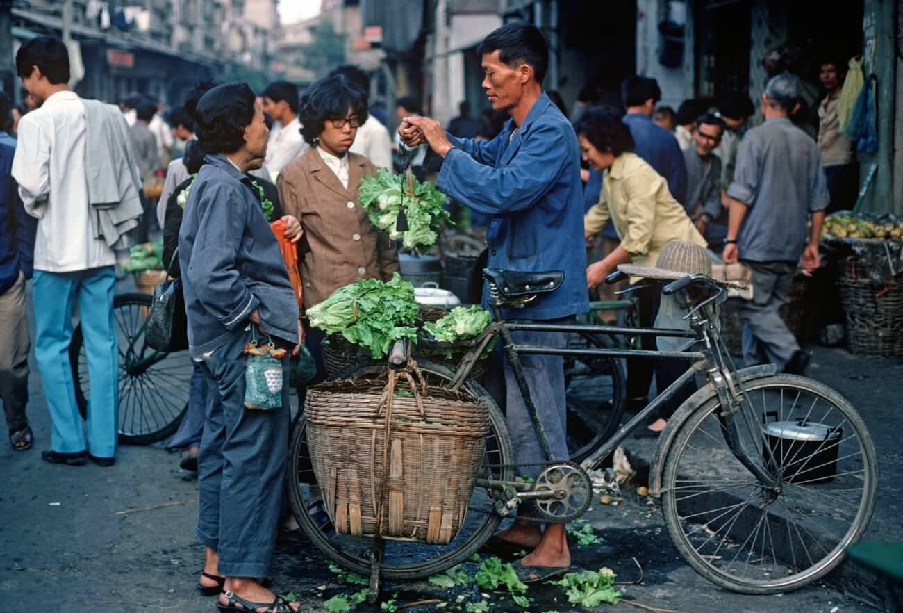 Chinese lettuce seller, Guangzhou street market,, China, 1980