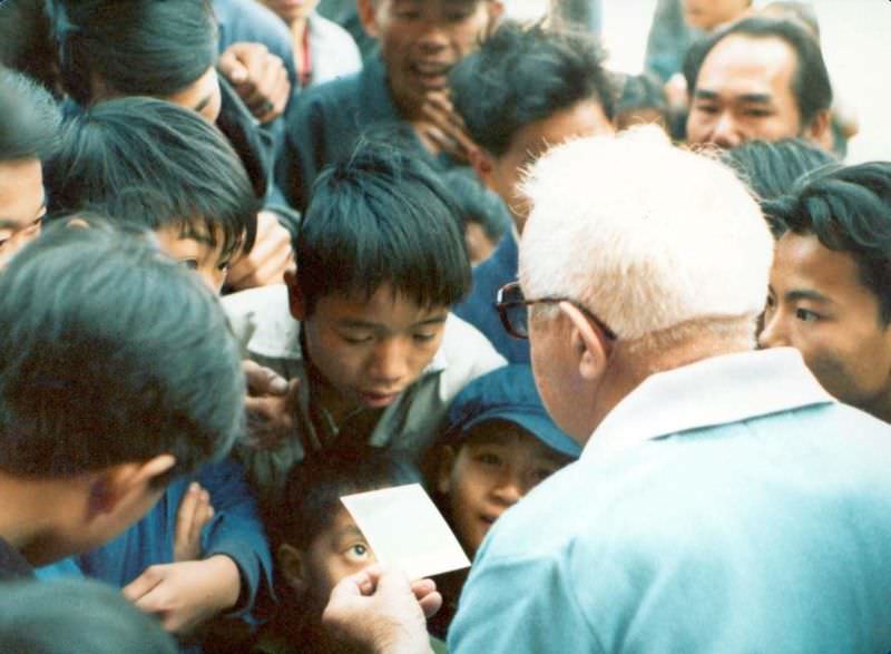 Showing a Polaroid picture, Guangzhou, 1978