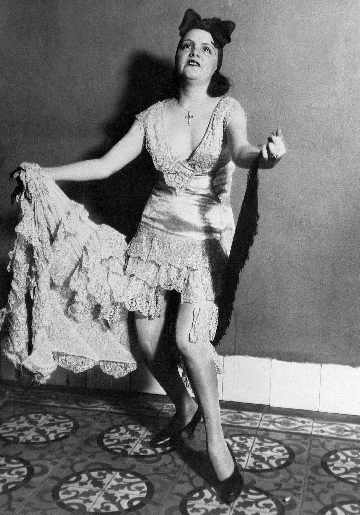 A typical "Rumba" dancer of Cuba wearing the costume considered most proper, 1930