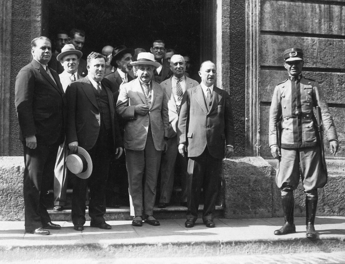 Physicist Dr. Albert Einstein poses with dignitaries at the Cuban Academy of Sciences in Havana, Cuba, 1930