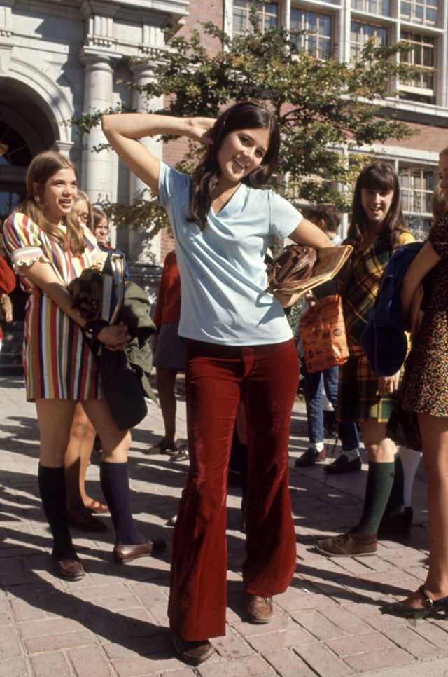 A high school student wore bell bottoms and boots, 1969.