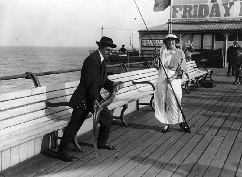 Mdlle Simone Mariex lands a conger eel on the pier at Folkestone during the International Beauty Show.