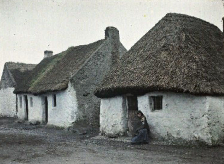 Mother and child outside their humble dwelling in Claddagh, Galway, 25 May 1913