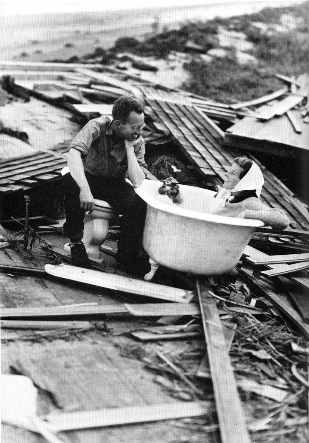 Kate Hepburn sitting in a tub after the Great New England Hurricane of 1938.