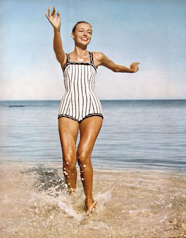 Liz Pringle in black and white striped maillot by Jantzen, 1956