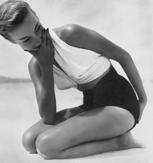 Liz Pringle in white halter top and black brief bottoms, Harper's Bazaar UK, June 1949