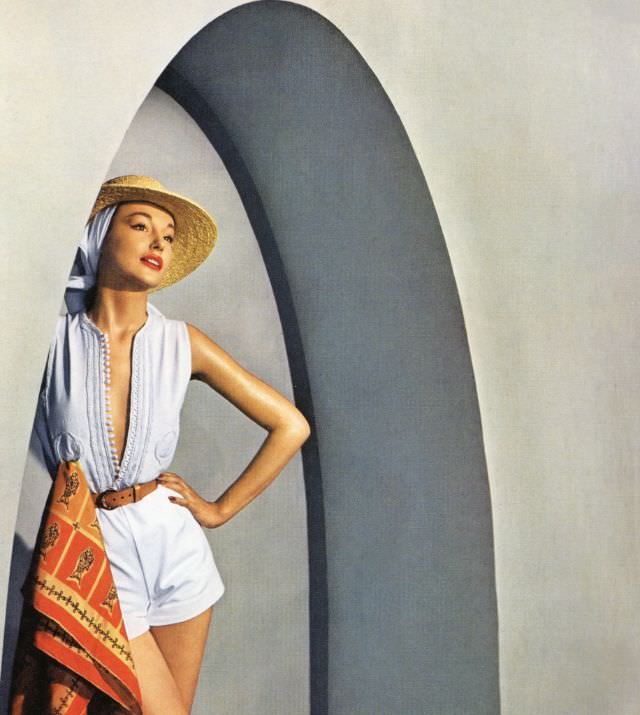 Liz Pringle in Carolyn Schnurer's white oxford cloth shorts and top with white cord passementerie based on a djellabah, June 1950