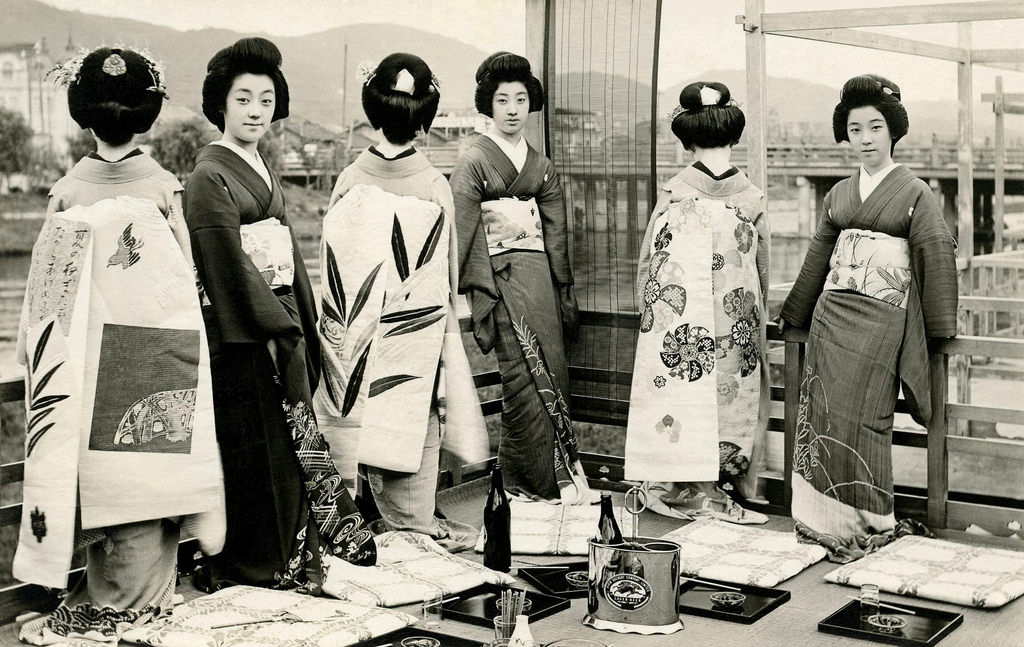 Posing for a shot by the Kamo River, 1920s