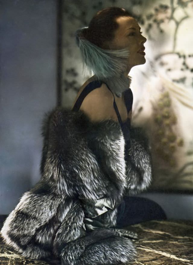 Meg Mundy in luxurious long-hair silver fox fur designed by Sophie of Saks Fifth Avenue, Vogue, May 1, 1947