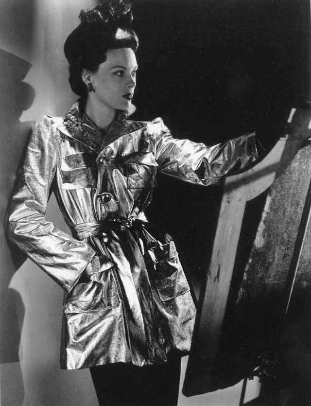 Meg Mundy in a 22-carat gold-washed kid trench coat by Mainbocher, Vogue, September 15, 1940