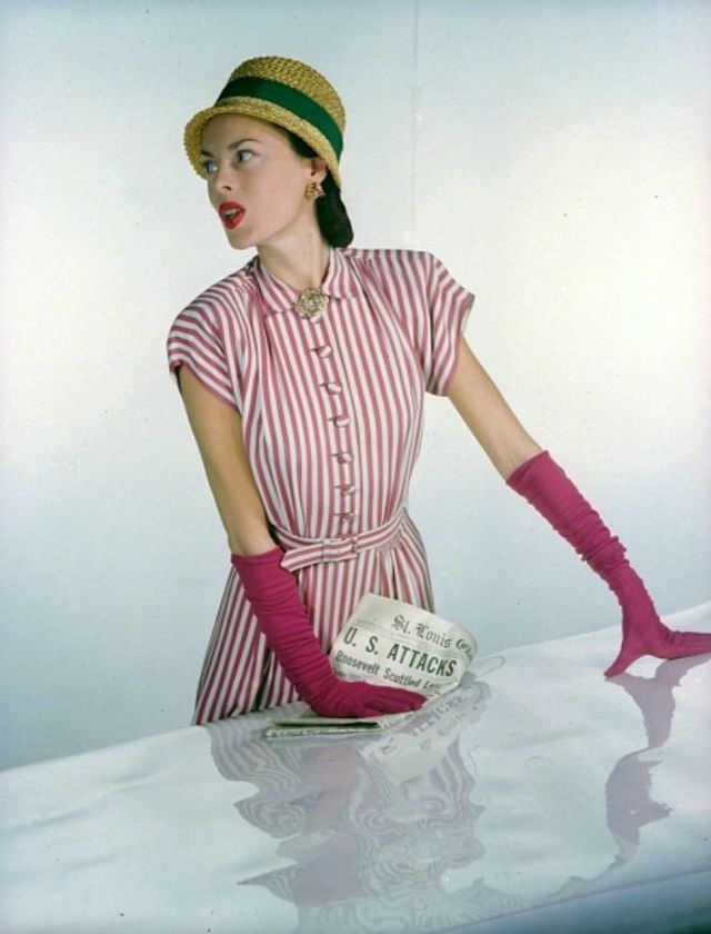 Meg Mundy in red and white striped shirtwaist dress of rayon crêpe by William Bass, Vogue 1945