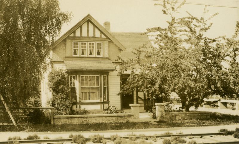 207 Behnsen Street. At corner of Maple Street. Streetcar tracks in foreground