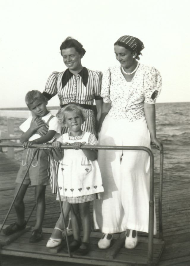 Two ladies and two children posing on a landing stage. Originally the photograph comes from the city of Breslau, today known by its Polish name of Wroclaw, 1938