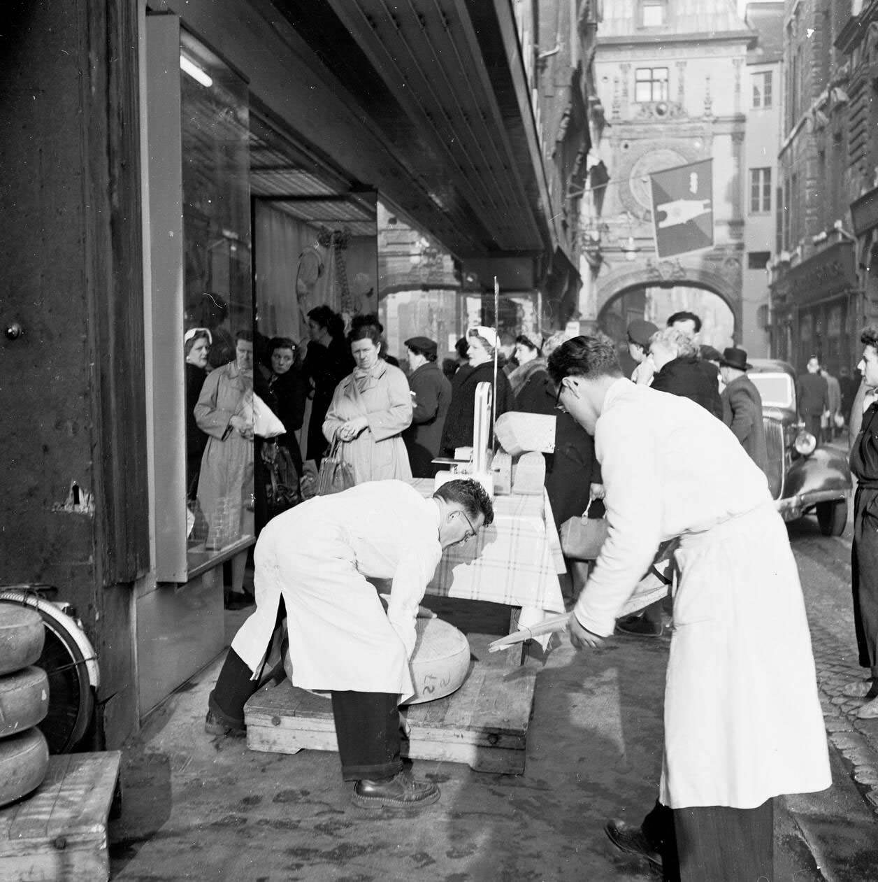 Shoppers Waiting in Rouen, Selecting Gruyere Cheese, 1950s