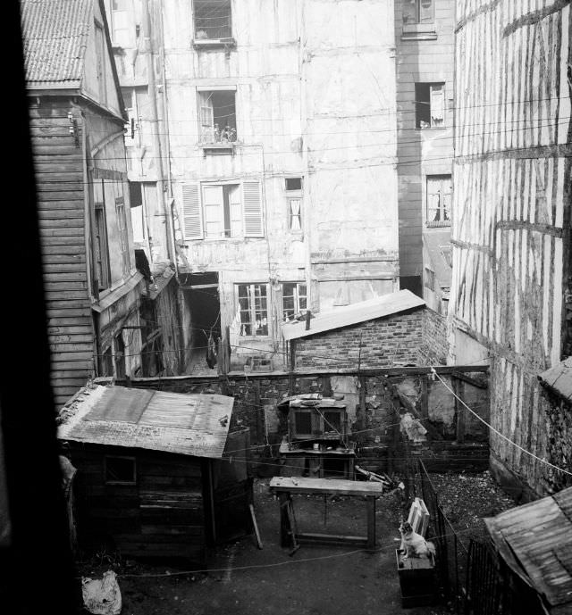 Courtyard between buildings in the eastern district, Rouen, September 1951