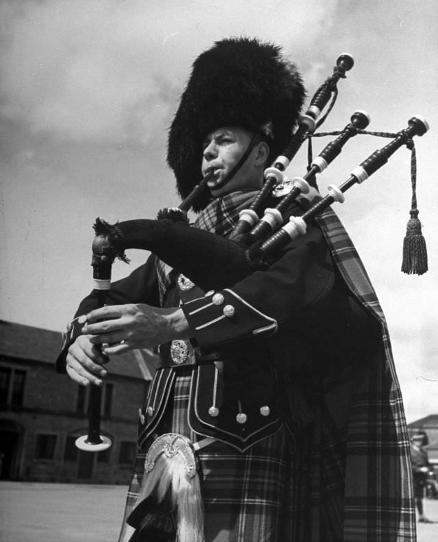 In full dress, a piper of the famed Black Watch regiment piped a pibroch at Perth Barracks.